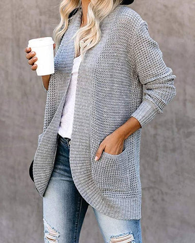 CARDIGAN WITH CURVED FRONT AND LARGE POCKET